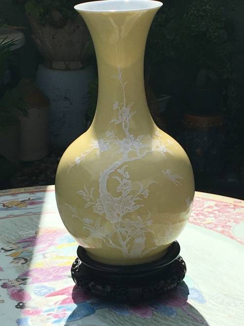 Large Chinese Yellow Prunus Vase with white blossoms on Carved Wood Stand