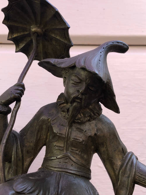 Amazing heavy cast bronze Chinese figurine on a wooden base