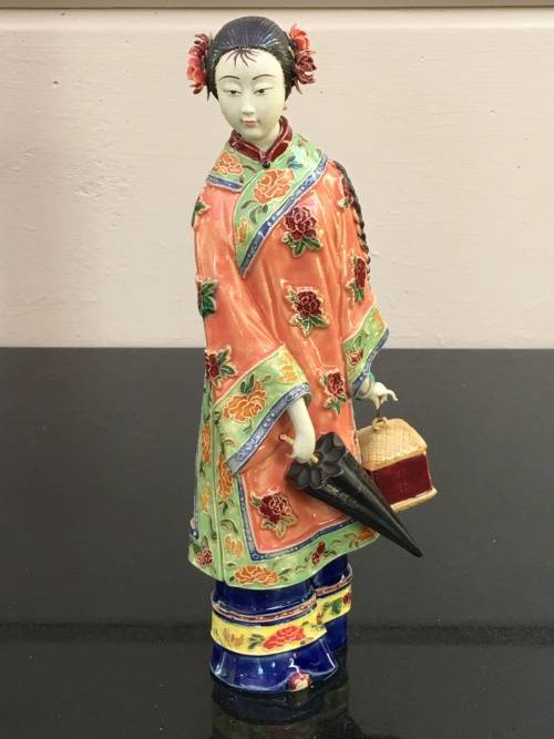 A Signed Chinese Shiwan female figurine hand sculpted and decorated. 30.5 cm tall