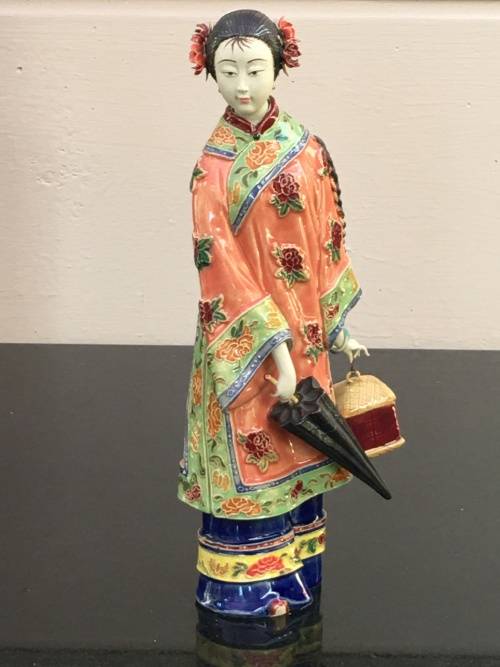 A Signed Chinese Shiwan female figurine hand sculpted and decorated. 30.5 cm tall