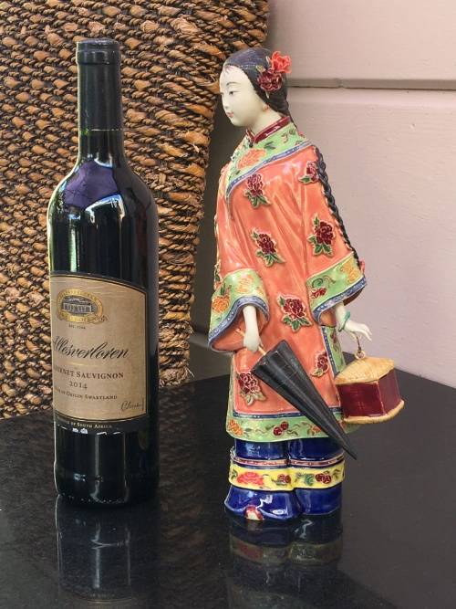 A Signed Chinese Shiwan female figurine hand sculpted and decorated. 30.5 cm tall