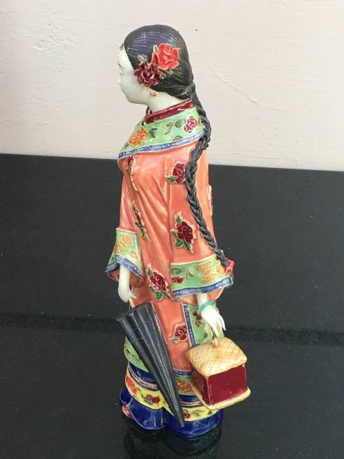 A Signed Chinese Shiwan female figurine hand sculpted and decorated. 30.5 cm tall
