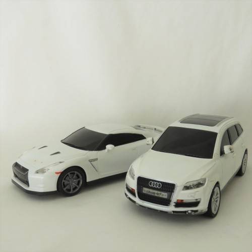 Pair of RASTAR remote control cars - Not tested - No remotes - 27 MHZ