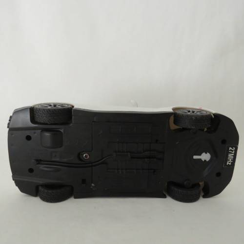 Pair of RASTAR remote control cars - Not tested - No remotes - 27 MHZ