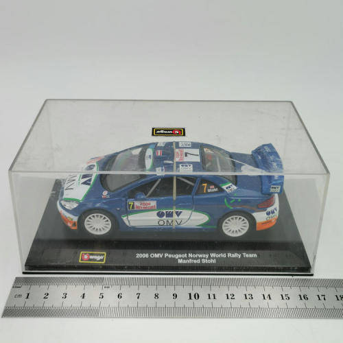Bburago 2006 OMV Peugeot Norway World Rally team die-cast model car - scale 1/32