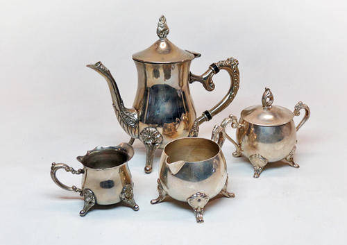 Vintage silver plated tea set with sugar-, milk- and cream jugs