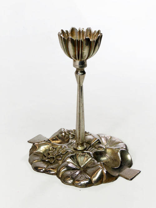 Unique and beautiful old art nouveau candle holder.