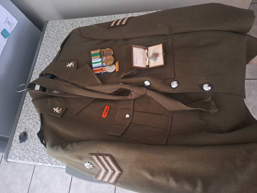 Vintage military medals and clothing ect