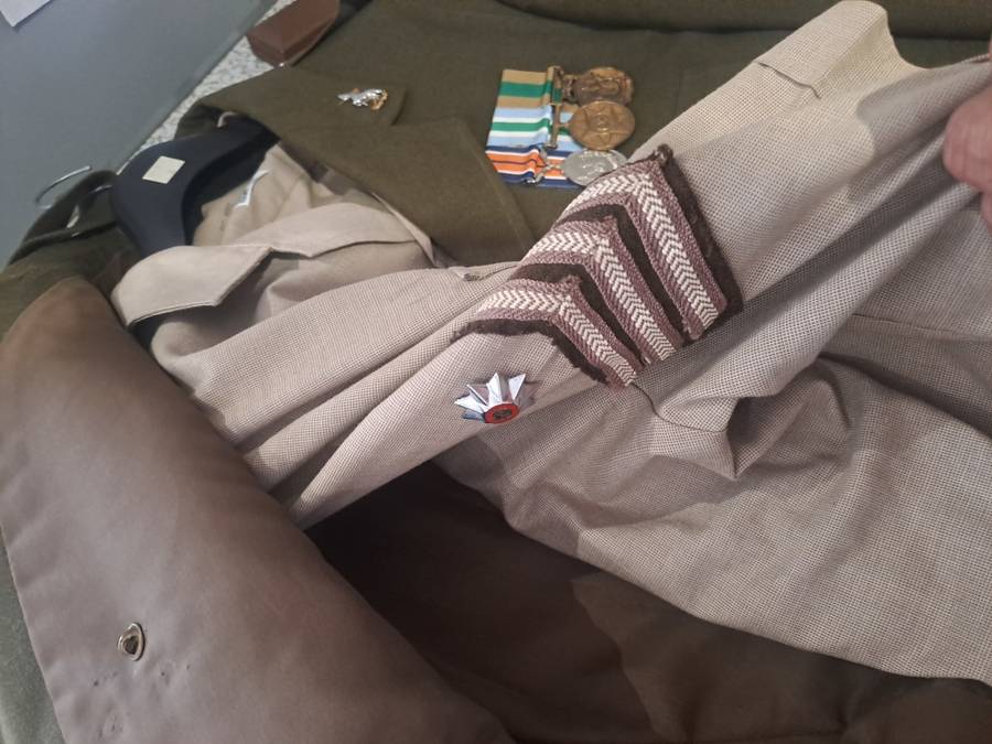 Vintage military medals and clothing ect