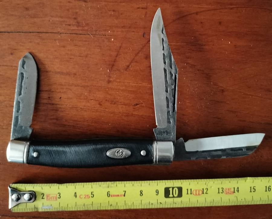 Vintage pocket knife with interesting detail on blade