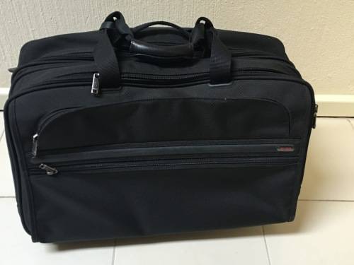 TUMI overnighter bag/briefcase on wheels
