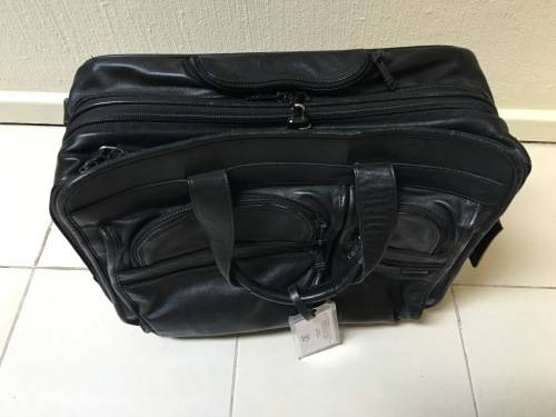 TUMI leather briefcase