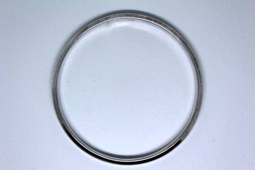 Large Hallmarked Chester 1924 Silver Bangle. Bevelled edges. 27cm diameter.