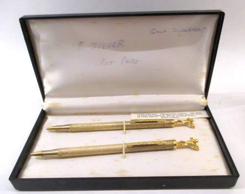 "Sport King Pen" and Pencil Set, depicting Golf Player. Gold Colored. In Box. Presented as !st Price