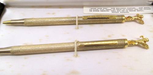 "Sport King Pen" and Pencil Set, depicting Golf Player. Gold Colored. In Box. Presented as !st Price