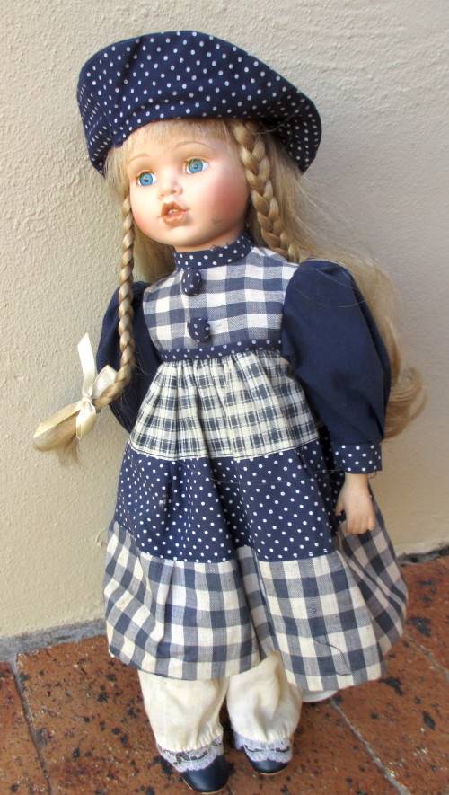 Vintage Lovely Porcelain Doll. Soft Body. On Stand Original Clothes. 40cm high.