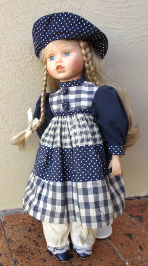 Vintage Lovely Porcelain Doll. Soft Body. On Stand Original Clothes. 40cm high.