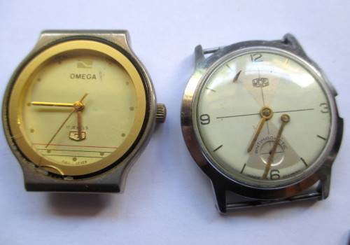 Lot of Five Watches. Not working. Good for Parts or just needs battery.