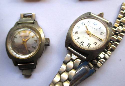 Lot of Five Watches. Not working. Good for Parts or just needs battery.