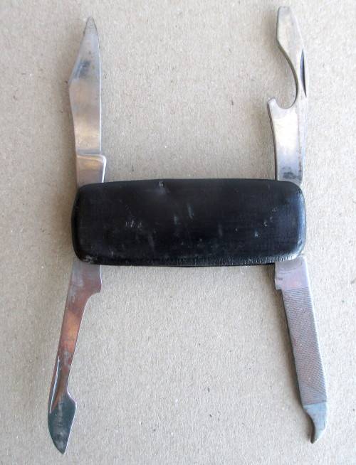 vintage Stainless Steel Pocket Knife. Leather Covered. As per Photo.