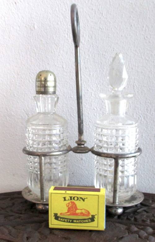 Vintage Silver Plate Elkington Two piece Cut Glass Cruet Set. Plate warn as per photo.