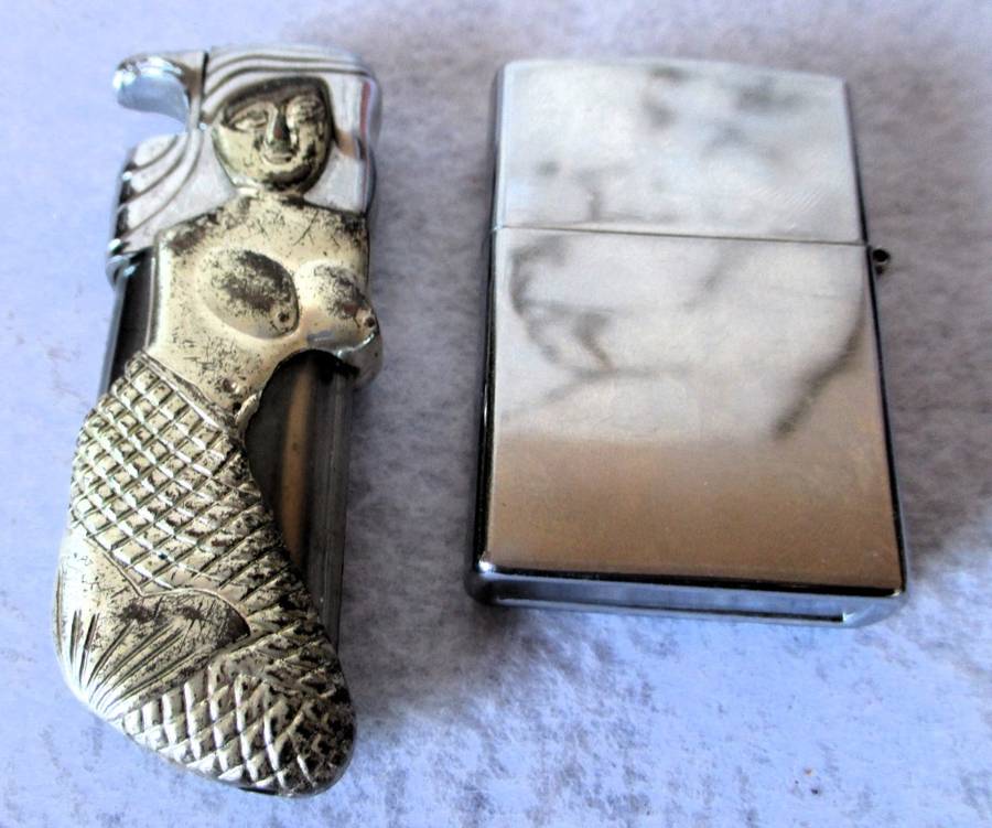 Two lighters as per photo. As is.