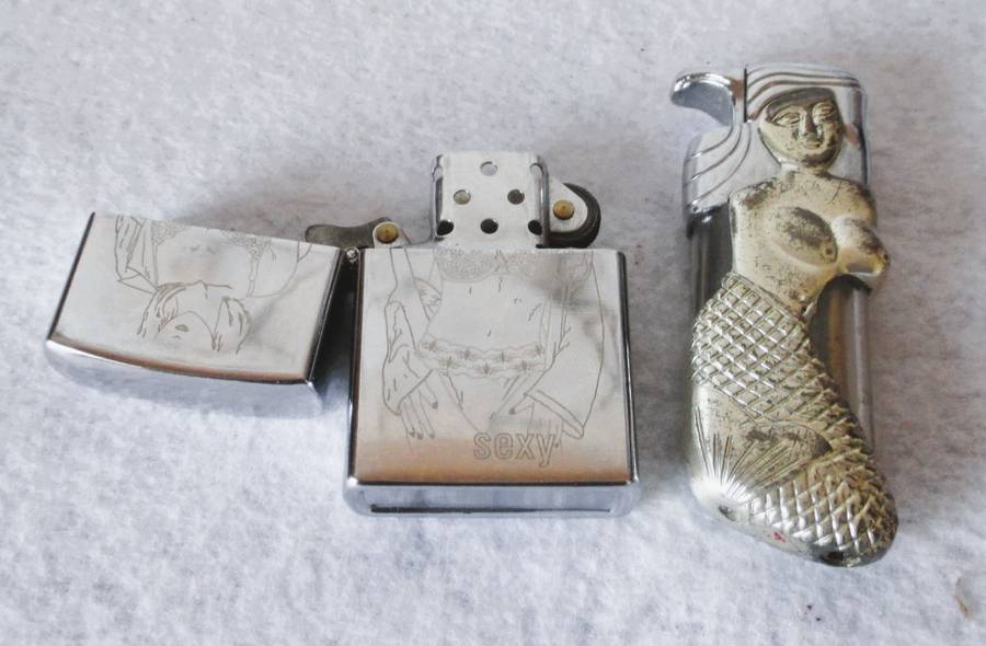 Two lighters as per photo. As is.