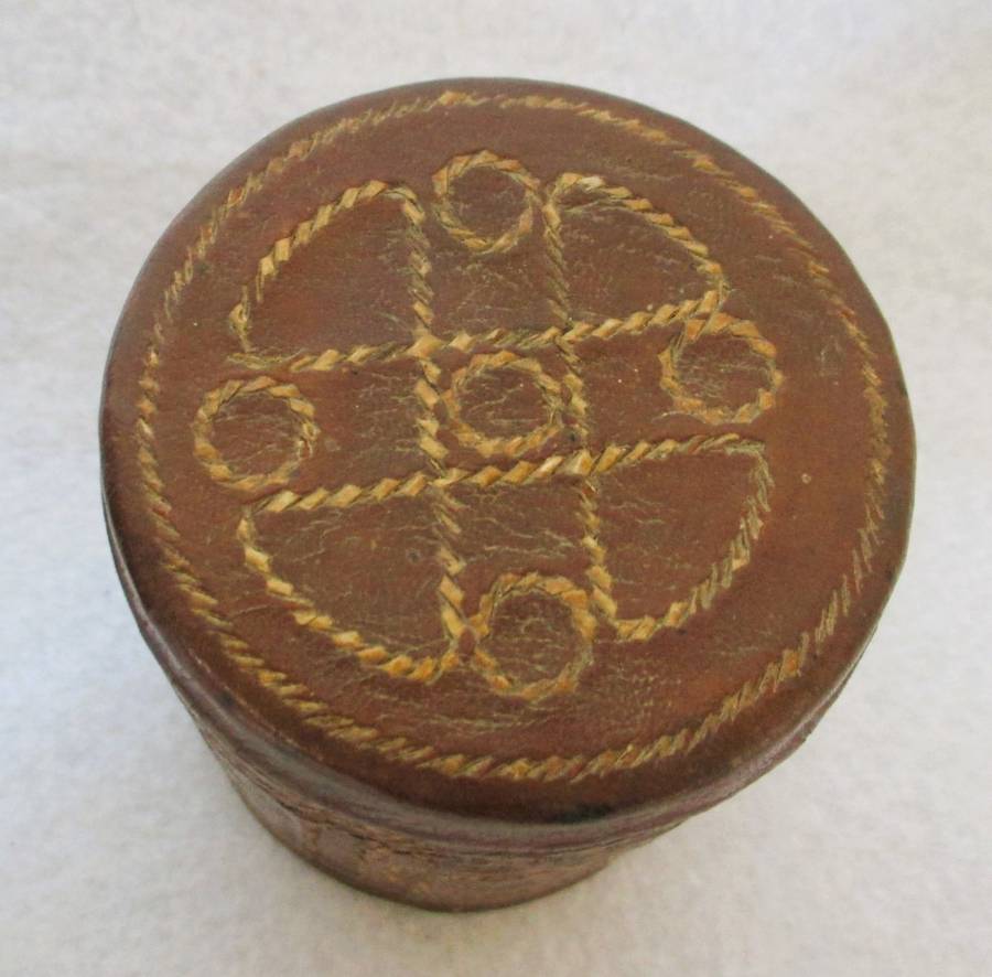 Prisoner of war trench art leather covered cigarette tins. 100mm and 85mm high. Very collectable