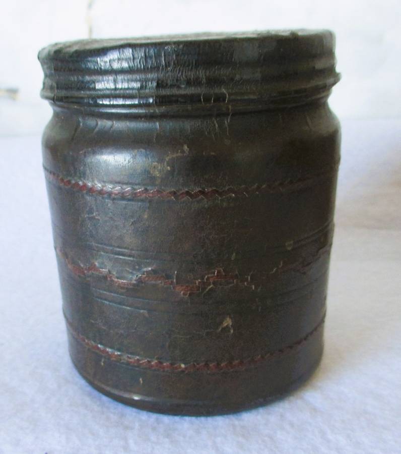 Prisoner of war trench art leather covered cigarette tins. 100mm and 85mm high. Very collectable