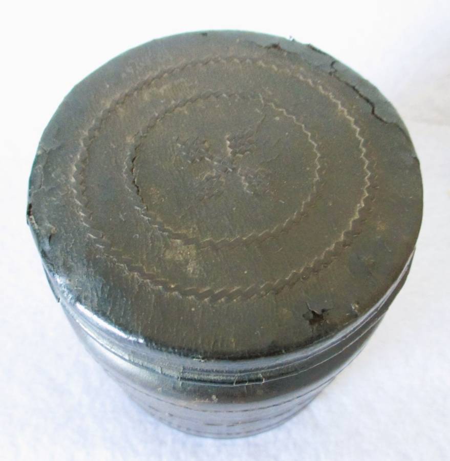 Prisoner of war trench art leather covered cigarette tins. 100mm and 85mm high. Very collectable