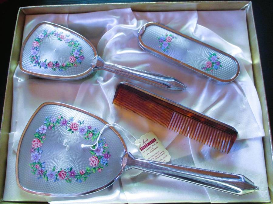 Vtage ladies dressing table set, hair brush, mirror, comb and clothes brush in silver finish, in box