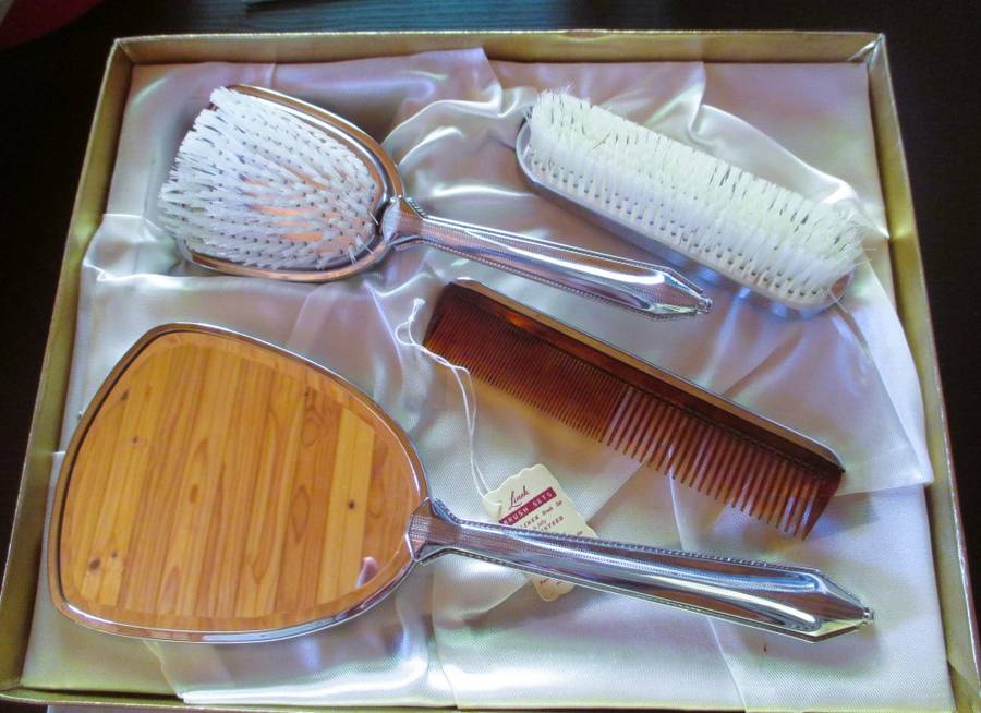 Vtage ladies dressing table set, hair brush, mirror, comb and clothes brush in silver finish, in box