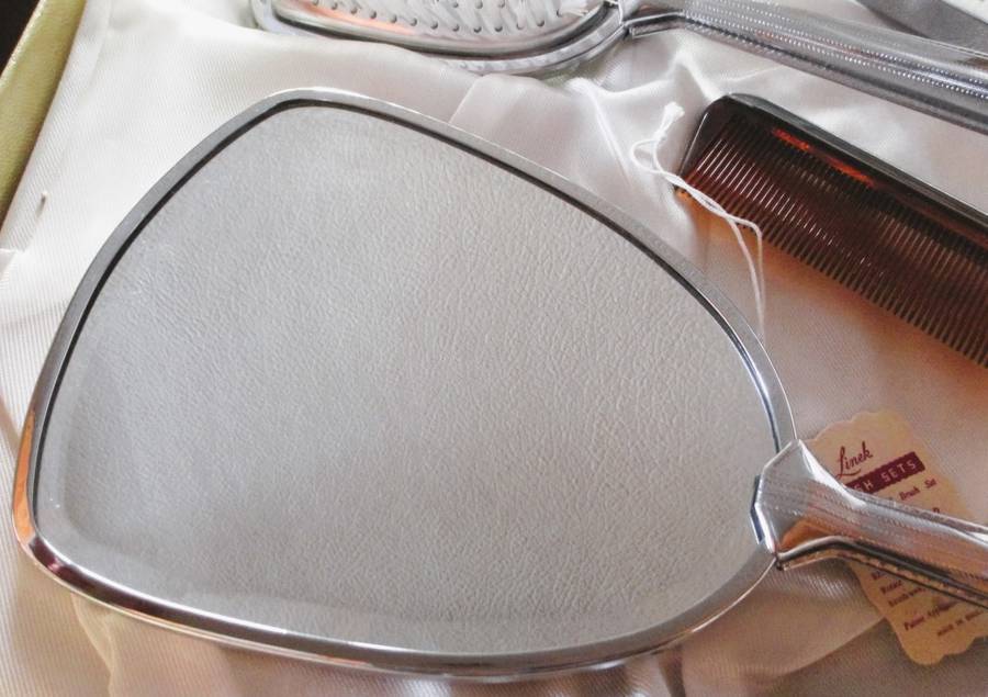 Vtage ladies dressing table set, hair brush, mirror, comb and clothes brush in silver finish, in box