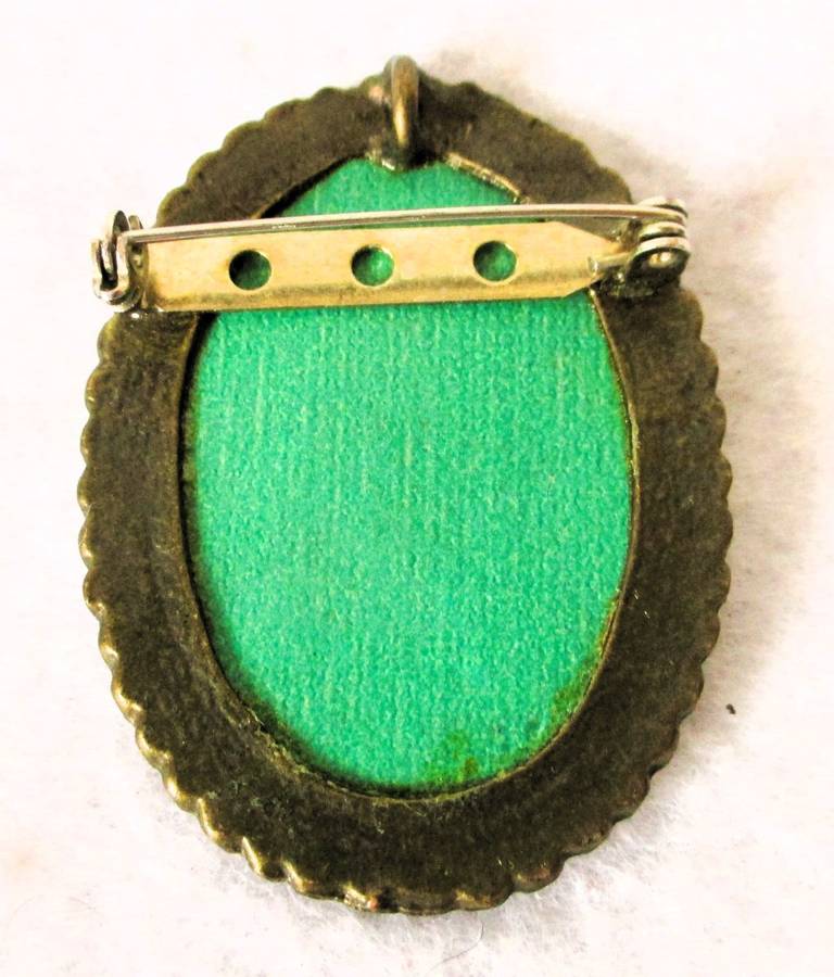 Vintage handpainted silk brooch and pendant. Pastel colors set in hard metal rope frame. 45x35mm