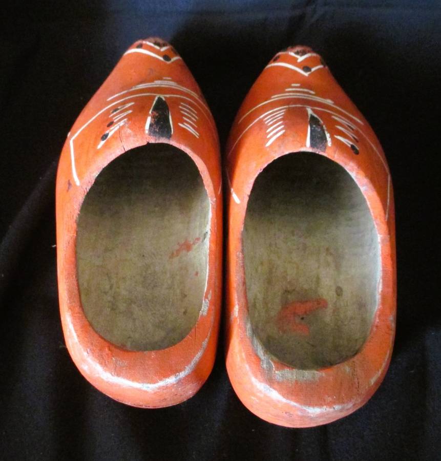 Dutch wooden clogs used as a decorative element. 22cm long.
