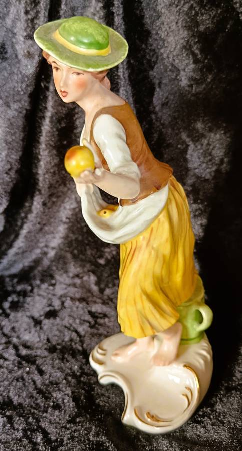 Vintage 1969 Goebel Hummel West Germany figurine of lady picking fruits German painted. 200mm high.