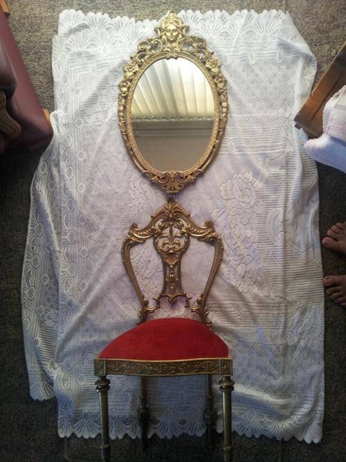 brass chair and mirror