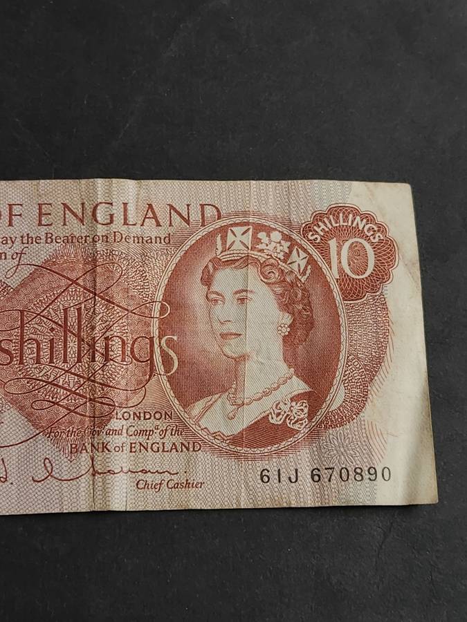 Bank of England 10 Shillings (tear top left side of note) - as per photograph
