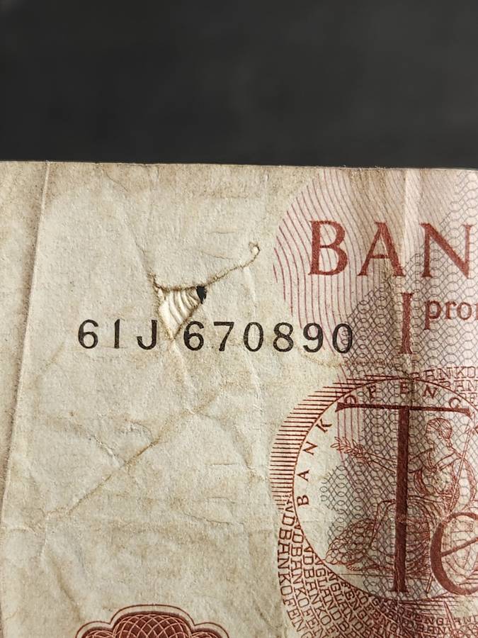 Bank of England 10 Shillings (tear top left side of note) - as per photograph