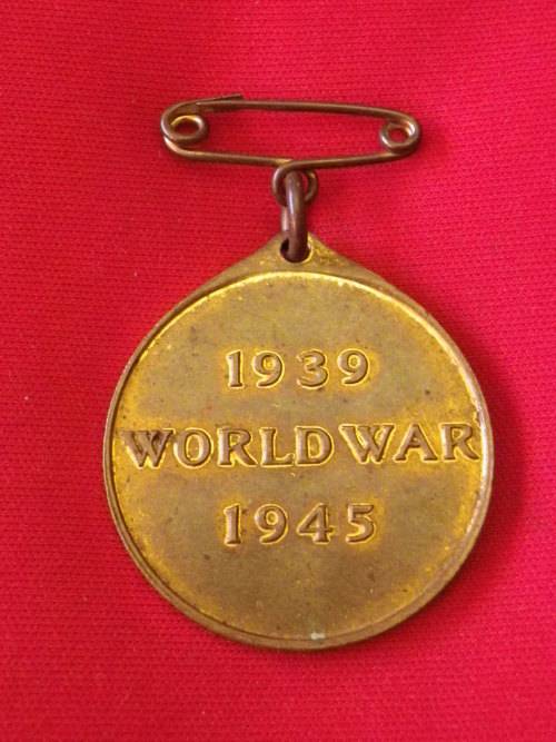 RHODESIAN WW2 BRASS MEDALLION (3977)