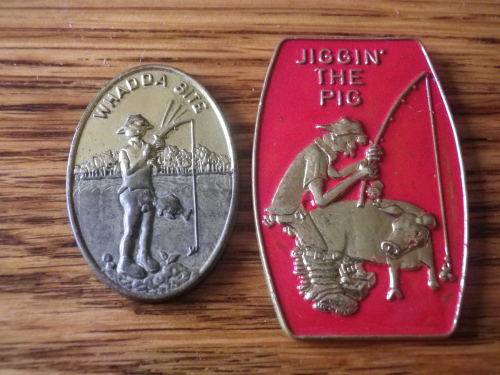 RHODESIA - 2 X FISHING LAPEL BADGES - PINS  MISSING - "JIGGIN THE PIG" + "WHADDA BITE"   (7269)