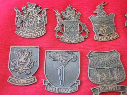 RHODESIAN LOT  - 16 X CITY / TOWN / PLACE CRESTS - OFF A DISPLAY - HAS MOUNTING RESIDUE ON REVERSE