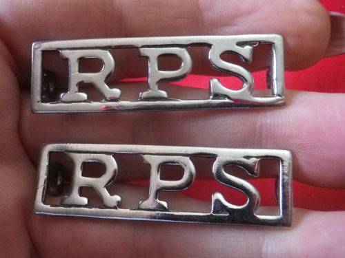 RHODESIA PRISON SERVICES - PAIR OF CHROMED SHOULDER TITLES     (7559)