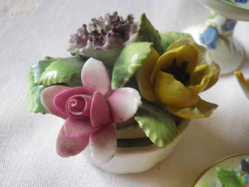 4 SMALLPRETTY  PORCELAIN ITEMS - NOTE 1 CHIP ON FLOWER OF LID OF THE BOX...OTHERS IN GOOD CONDITION