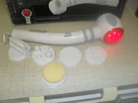 CARMEN TONING MASSAGER -INFRARED with an extendable handle and rotating massage head