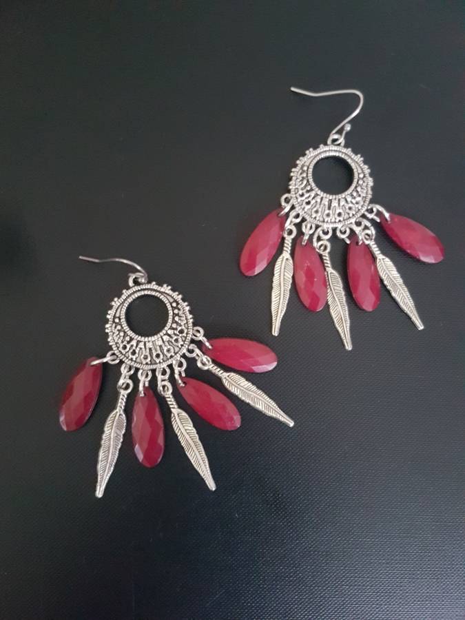 Stunning boho / gypsy feel earrings with maroon faceted teardrop beads & feathers  The hoops are sta