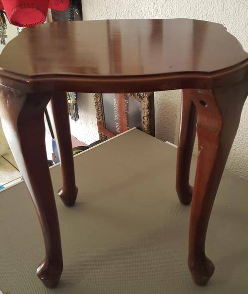 A set of three beautiful small coffee tables