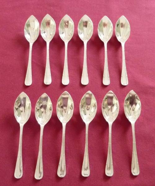 12 silver plated grapefruit spoons