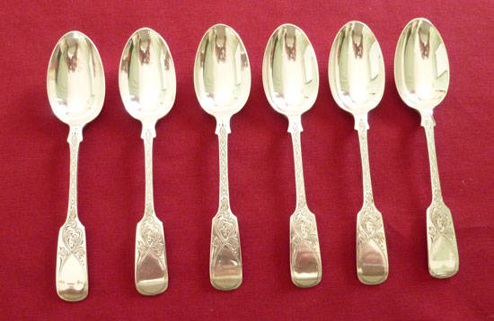 A superb set of Edwardian silver large teaspoons