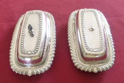 Pair of silver plated butter dishes